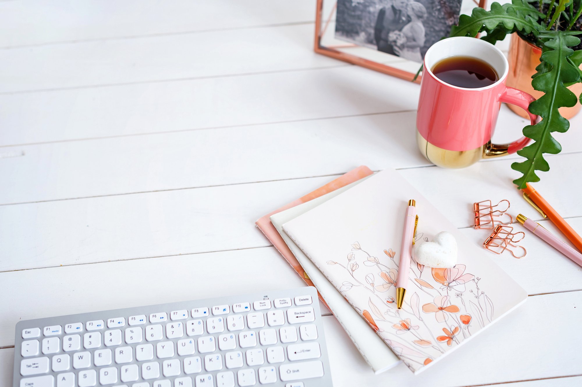 journal, pen, cup of tea, keyboard